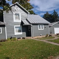 House exterior, painting, and trim detail from Solara’s project portfolio