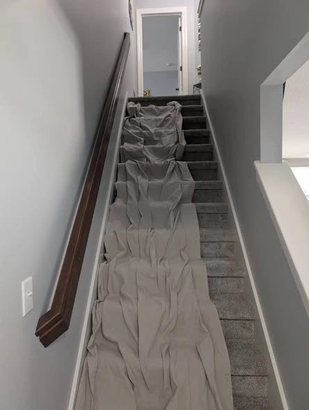 Indoor staircase showing flooring and finish details