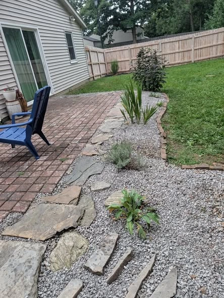 Paver patio, planting beds, and outdoor property work