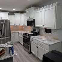 Kitchen cabinetry, cabinet panels, and interior finish details