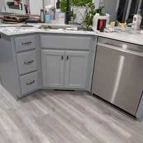 Kitchen cabinetry, cabinet panels, and interior finish details