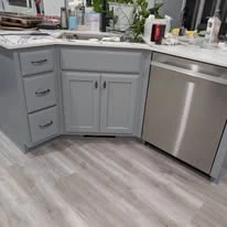 Kitchen cabinetry, cabinet panels, and interior finish details
