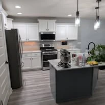 Kitchen cabinetry, cabinet panels, and interior finish details