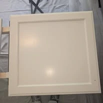 Kitchen cabinetry, cabinet panels, and interior finish details