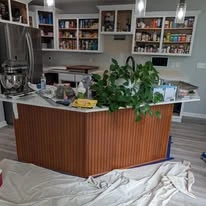 Kitchen cabinetry, cabinet panels, and interior finish details