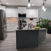 Kitchen cabinetry, cabinet panels, and interior finish details