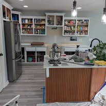 Kitchen cabinetry, cabinet panels, and interior finish details