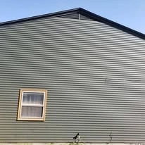 Home exterior showing paint colors, siding, windows, and trim
