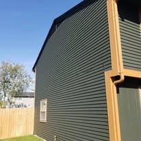 Home exterior showing paint colors, siding, windows, and trim
