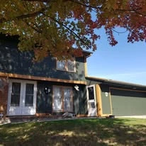 Home exterior showing paint colors, siding, windows, and trim