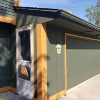 Home exterior showing paint colors, siding, windows, and trim