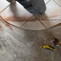 Interior floor project, including existing surfaces and wood-look plank flooring